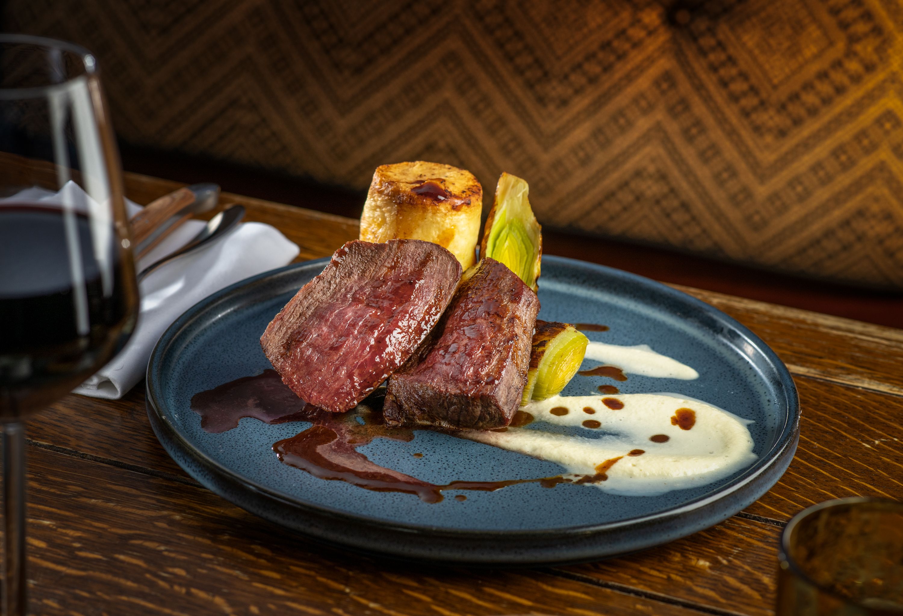 venison loin served with vegetables in a pub