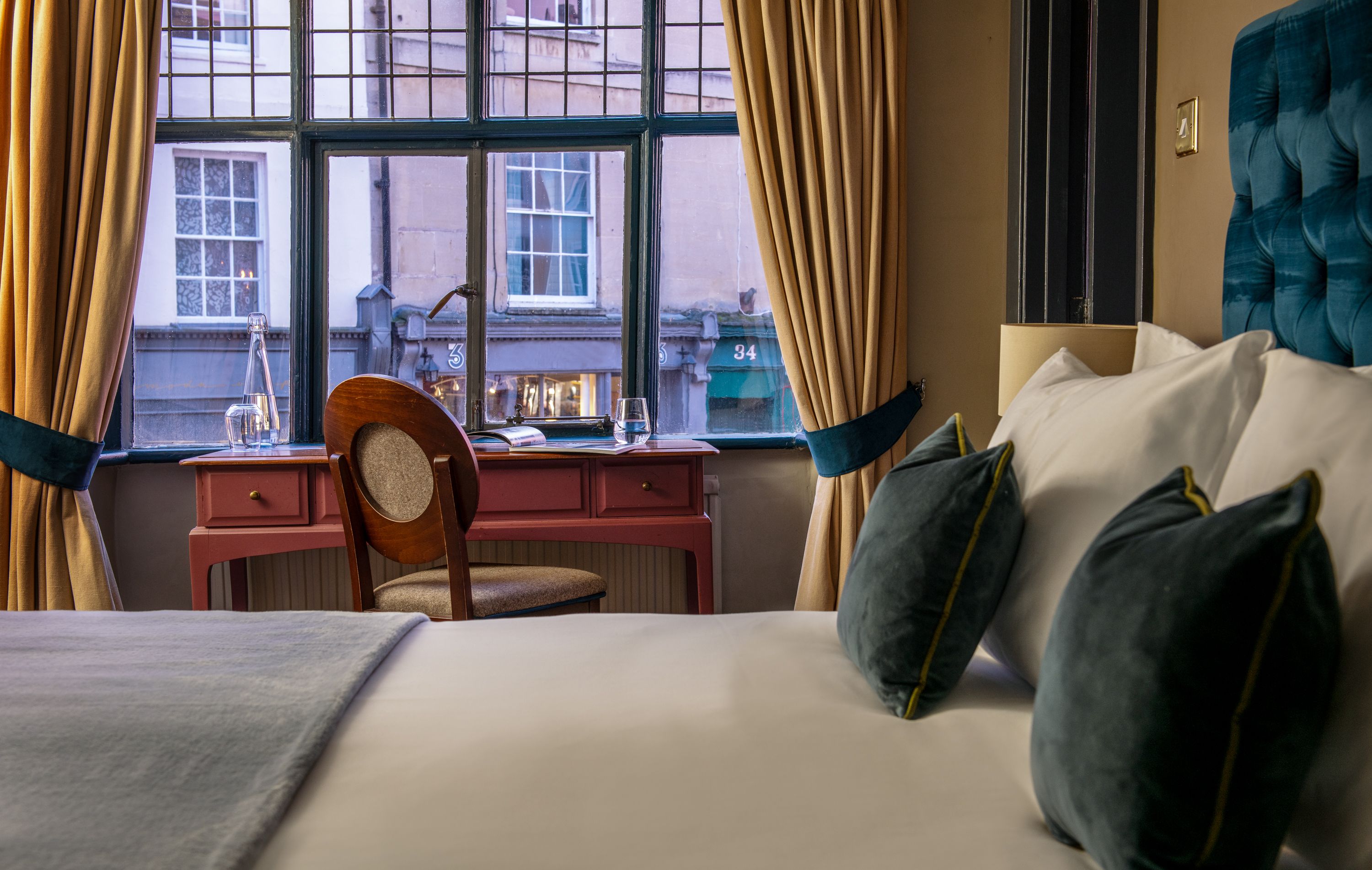 standard bedroom at the fleece with view out to high street